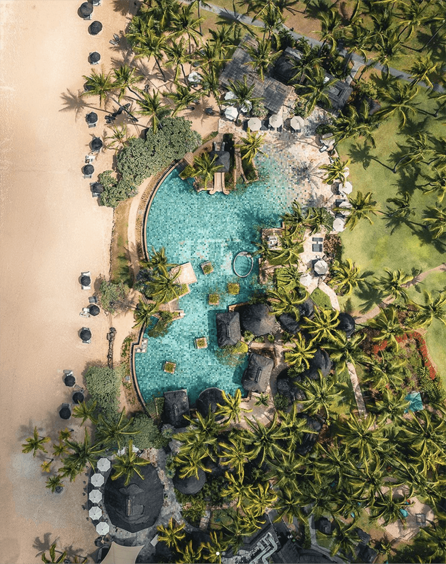 An aerial view of the picturesque resort and its beach